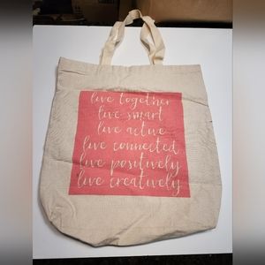 Justice Fabric Positivity Reusable Bag 16in. tall x 15in. wide.